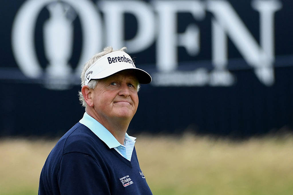 Colin Montgomerie smiles during The 145th Open at Royal Troon in 2016